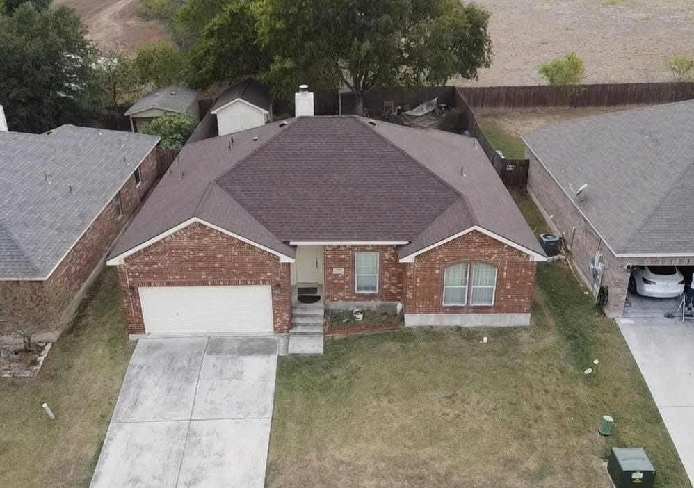 home residence with a new roof by Steel Country Home Restorations
